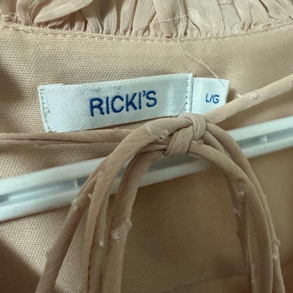 Ricki's blouse was worn once